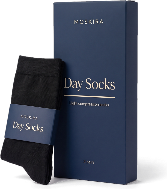 A box of Moskira Day Socks with a pair of black knee-high socks